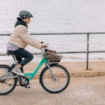 Customer on a Beryl Bike along seafront