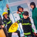 Children dressed as fireman / women