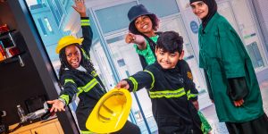 Children dressed as fireman / women