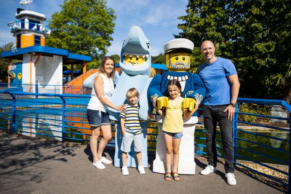 Family with Lego mascots